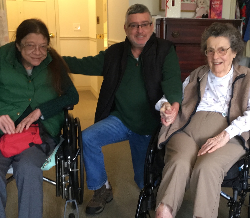 Karen Cobb, her mom Gloria, and Mark Ruttkay at the Hearth Retirement Center in Blacksburg, VA, 2018